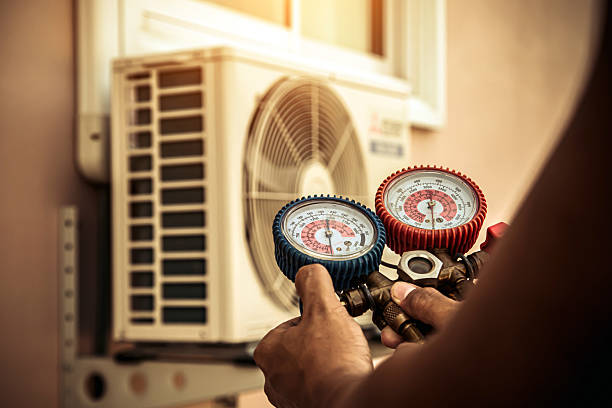 Professional Ac Installation technician working in Royal, IA
